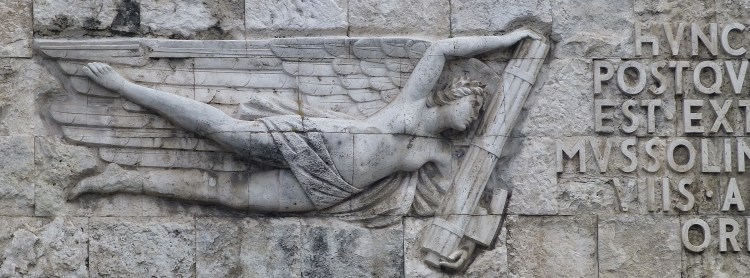 Nike carrying fasces toward Mussolini's name...Fascist architecture near the mausoleum of Augustus.